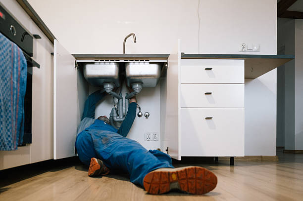 Professional Drain Cleaning technician working in Bend, TX